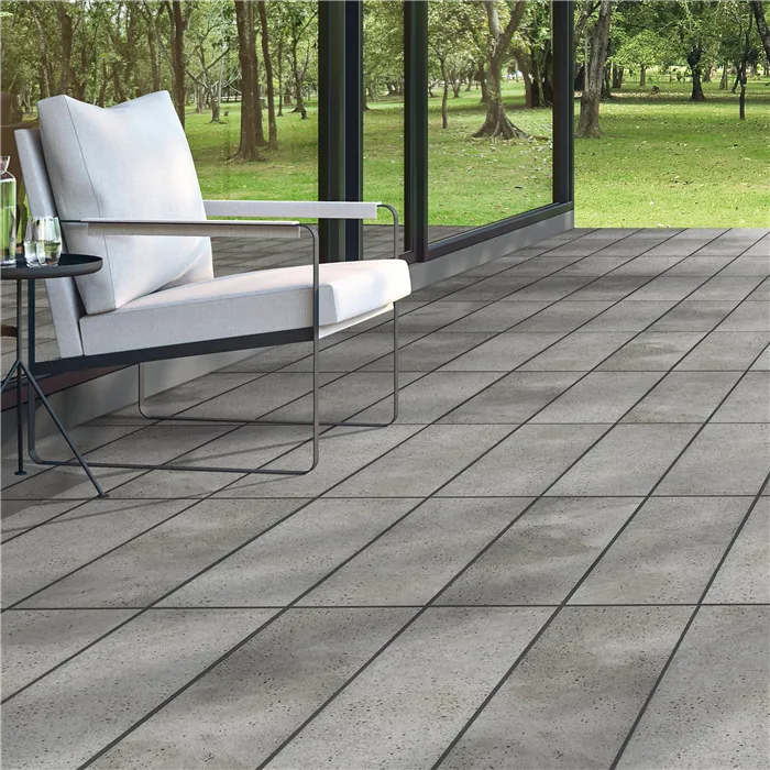 SEMMELROCK LUSSO VULCANO / dlaždice se zkosením a vzhledem vulkanického tufu 30x30x4 cm - granit antracitová