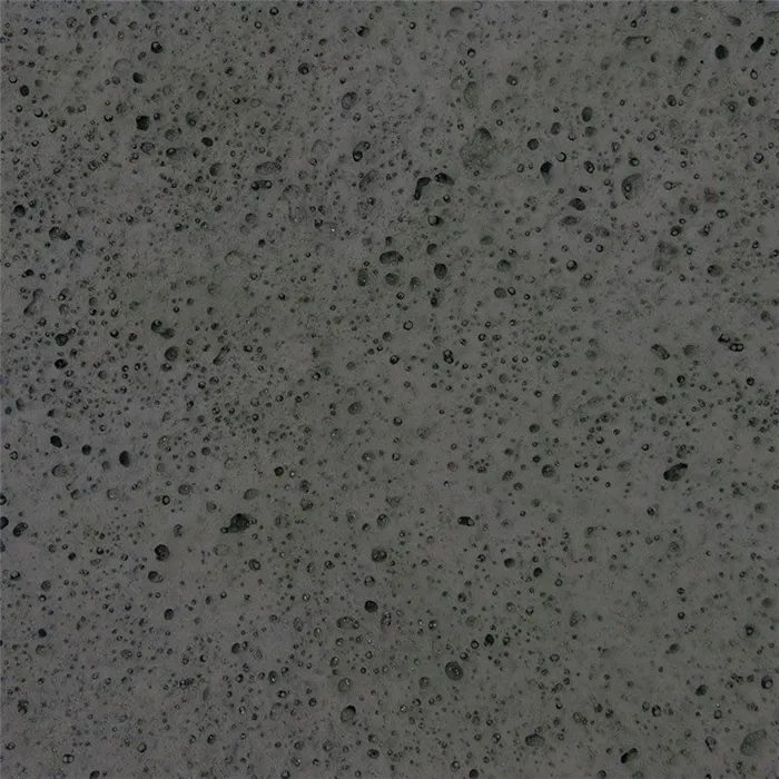 SEMMELROCK LUSSO VULCANO / dlaždice se zkosením a vzhledem vulkanického tufu 60x30x4 cm - granit antracitová