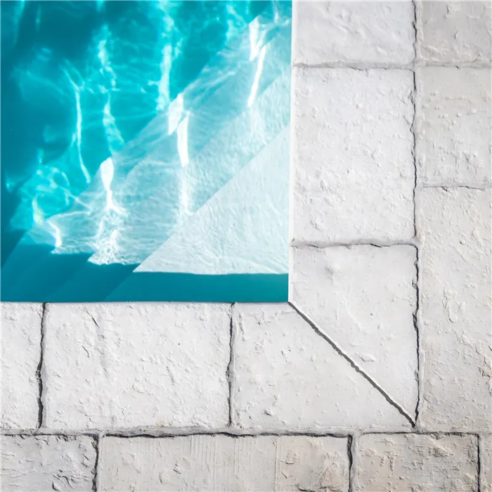 SEMMELROCK BRADSTONE OLD TOWN / bazénový lem - rohový prvek 45x45x4 cm - slonovinová